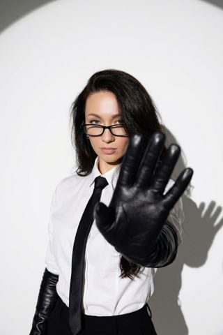 Women's portraits — Strict lady in black gloves