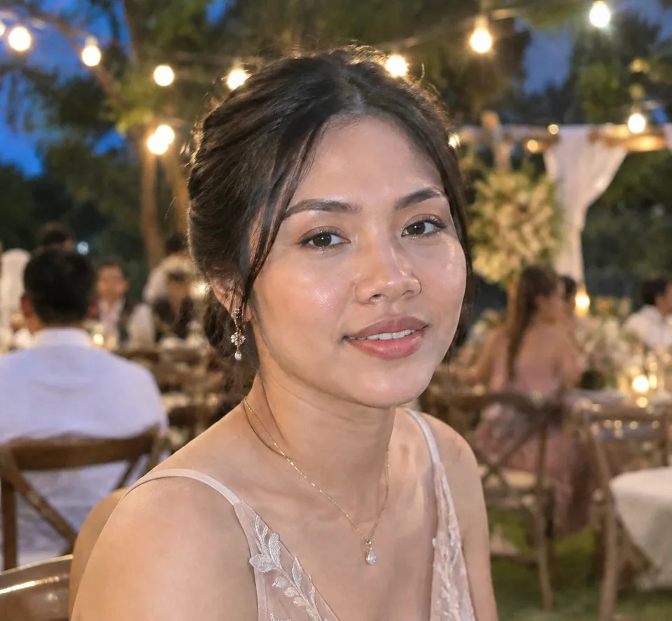 AI result: eyes open with a soft relaxed smile, lighting preserved