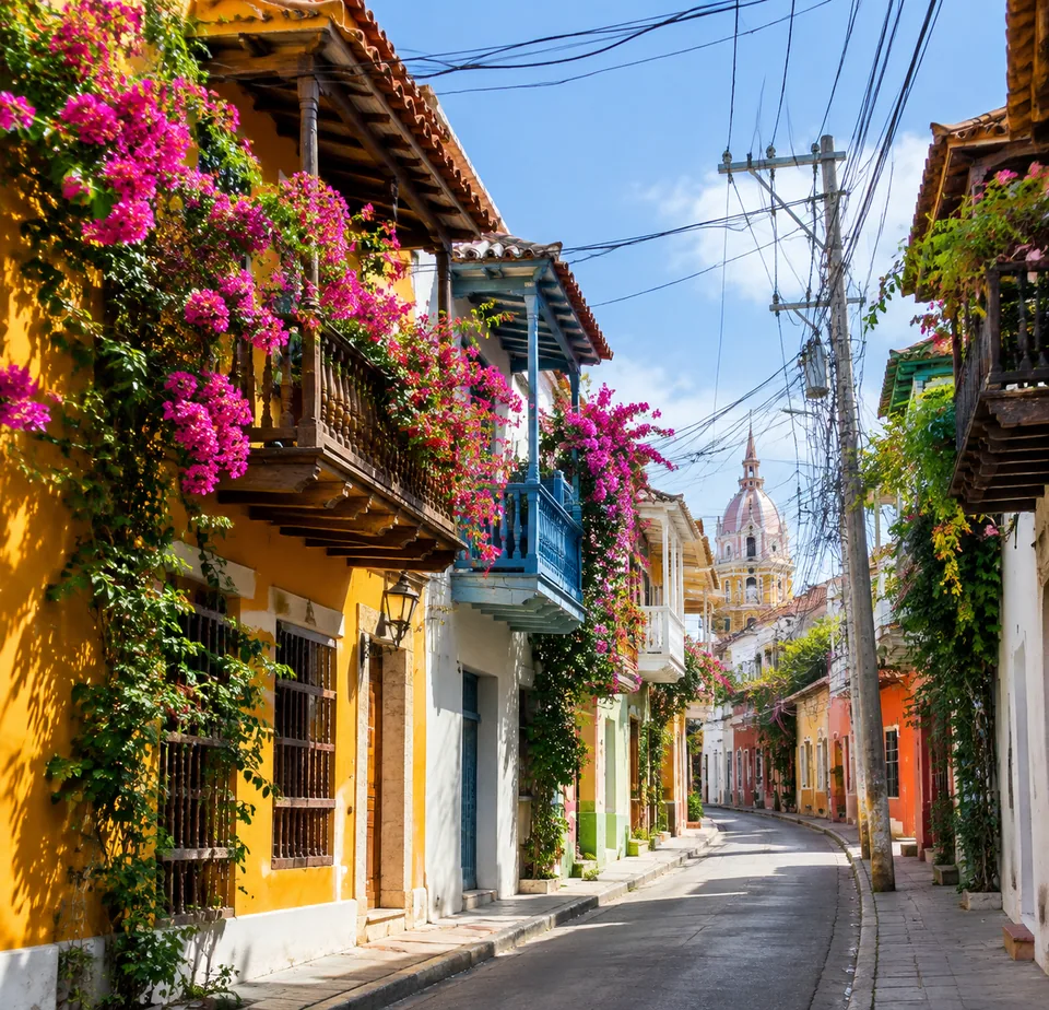 Colorful Cartagena street with tangled power lines overhead